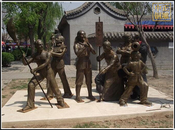 街頭賣藝人物銅雕塑