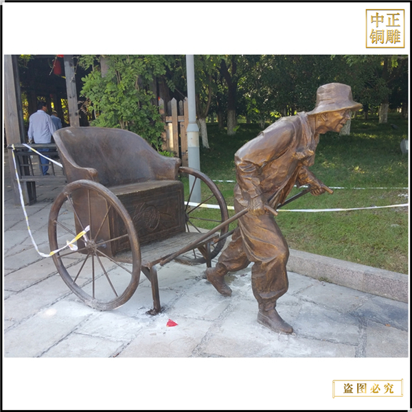 5景區拉車人物銅雕塑.jpg